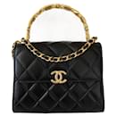 Black Lambskin with top handle flap bag Clutch - Chanel