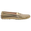 Tod's Gommino Driving Shoes with Perforated Design in Gold Leather 