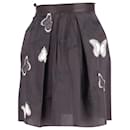 Saia Dolce & Gabbana com aplique de borboleta em seda preta