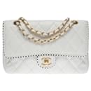 Lovely Chanel Timeless Medium limited edition single flap bag in white quilted leather and dotted navy edging on the flap, GHW