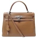 Hermès Kelly handbag 28 Return 2006 LEATHER TOGO GOLD BANDOULIERE HAND BAG