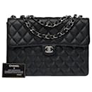 Exceptional Chanel Timeless Jumbo Single flap bag handbag in black quilted caviar leather