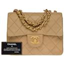 Superb Chanel Mini Timeless Flap bag in beige quilted lambskin