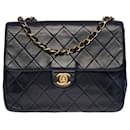 Splendid Chanel Mini Timeless Flap bag in navy blue quilted lambskin