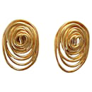 Golden "swirl" clips. - Balenciaga