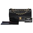 Beautiful Chanel Timeless/Classic handbag 23cm Flap bag in black partially quilted lambskin