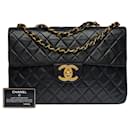 Majestic Chanel Timeless/Classique Maxi Jumbo single flap bag in black quilted lambskin,