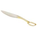 Hermès : Couteau à dessert "Grand Attelage" en métal plaqué or. Neuf.