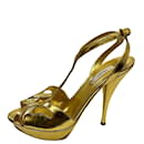 Golden Prada high heels