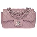 The exquisite "Must Have" Chanel Mini Timeless flap bag shoulder bag in purple lilac quilted lambskin
