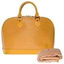 Superb Louis Vuitton Alma handbag in yellow epi leather, garniture en métal doré