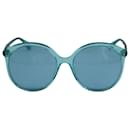 Gucci GG0257Halbtransparente runde S-Sonnenbrille aus türkisfarbenem Acetat