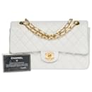 Superb Chanel Timeless Medium handbag 25cm with lined flap in white quilted lambskin