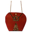 Bolso de mano con cadena de tela estampada roja de Cartier