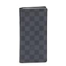 Portefeuille long en toile Damier Graphite Brazza Louis Vuitton en très bon état