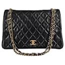 Chanel Timeless Classica 30 CM double flap turn lock bag in black leather