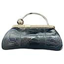 Gucci Leather Crocodile Black Pochette bag metal frame