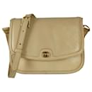 Gucci vintage 70s shoulder bag in beige leather, Camera model