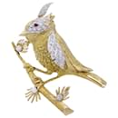 Boucheron brooch, "Bird on its branch", yellow gold, platinum.