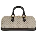 Louis Vuitton mini Alma handbag in canvas and leather