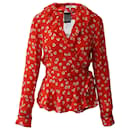 Blusa cruzada con diseño floral de crepé plateado de Ganni en viscosa roja Big Apple