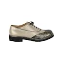 Scarpe Oxford stringate luccicanti bicolore Chanel