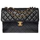 CHANEL TIMELESS MAXI JUMBO FLAP BAG CROSSBODY BAG IN BLACK QUILTED LEATHER100351 - Chanel