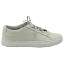 Common Projects Achilles Low Top Sneakers in Confetti White Leather - Autre Marque