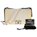 boy old medium shoulder bag in beige and yellow patent caviar leather -101150 - Chanel