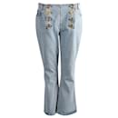 Balmain Verzierte, ausgestellte Low-Rise-Jeans aus hellblauer Baumwolle