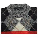 Suéter de punto a rayas en lana multicolor de Givenchy
