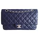 Chanel Classique caviar navy blue bag
