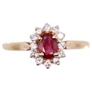Central ruby daisy ring and entourage of yellow gold diamonds 750%O - Autre Marque