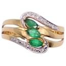 Anello trilogy di smeraldi a navetta e diamanti in oro giallo 750%O - Autre Marque