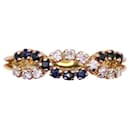Intertwined sapphires and diamonds ring in yellow gold 750%O - Autre Marque