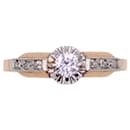 Belle Epoque solitaire ring shouldered with diamonds set in yellow gold 750%o and platinum - Autre Marque