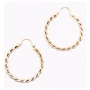 Yellow gold twisted hoop earrings 750%O - Autre Marque