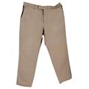 Pantalones Gucci con raya lateral en algodón beige