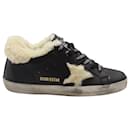 Golden Goose Super-Star Sneakers with Shearling Inserts in Black Leather