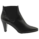 Stuart Weitzman Scooped Pointed-Toe Ankle Boots in Black Leather