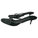 GUCCI Black mules em canvas com monograma T41C IT - Gucci