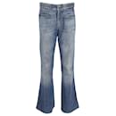 Yves Saint Laurent Calça jeans com bainha larga em jeans de algodão azul lavado