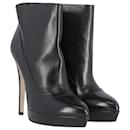 Dolce & Gabbana High Heeled Platform Ankle Boots in Black Leather