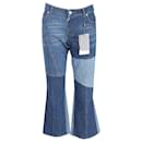 Calça jeans Kick Flare com painéis Alexander McQueen em algodão azul - Alexander Mcqueen