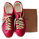 Red leather lace-up sneakers - Autre Marque
