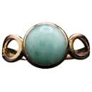 Bezel-set oval green stone ring in yellow gold 18 carats - Autre Marque