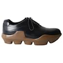 Zapatos Brogue con plataforma de Prada en cuero negro