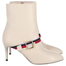 Gucci Sylvie Strap Ankle Boots in Ecru Leather