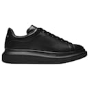 Oversized Sneakers in Black Leather and Black Heel - Alexander Mcqueen