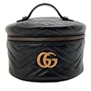Gucci GG Marmont Mini Matelassé-Lederrucksack aus schwarzem Leder